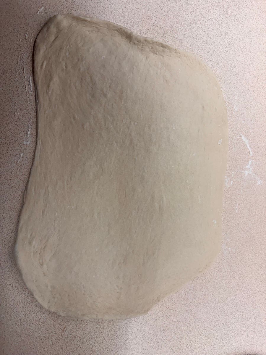 1.	Mix: Combine all dough ingredients (starter, water, flour, honey, salt, oil). Knead until smooth and elastic (about 8–10 minutes). 2.	Bulk Ferment: Let rise in a warm spot until doubled (since your starter is active, this may take 4–6 hours). 3.	Shape: Roll dough into a rectangle,