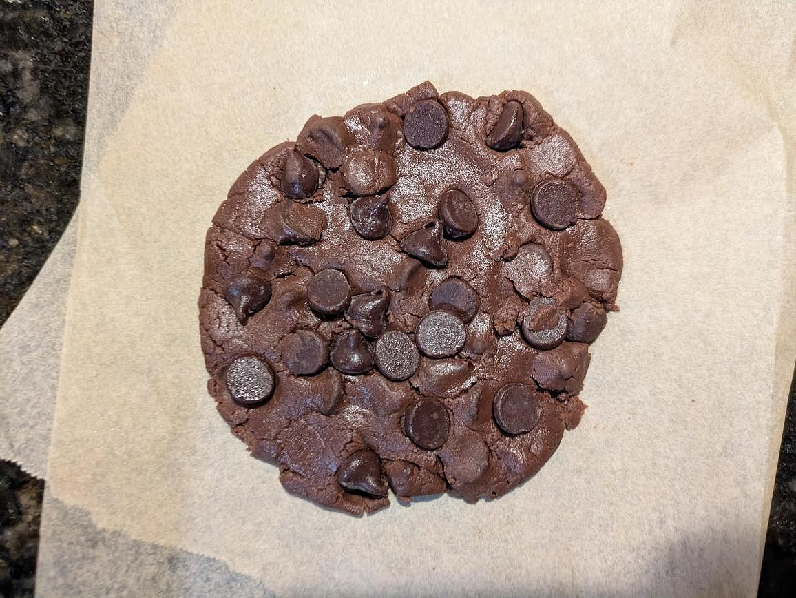 Press the dough into a thin circle. Top with your remaining chocolate chips