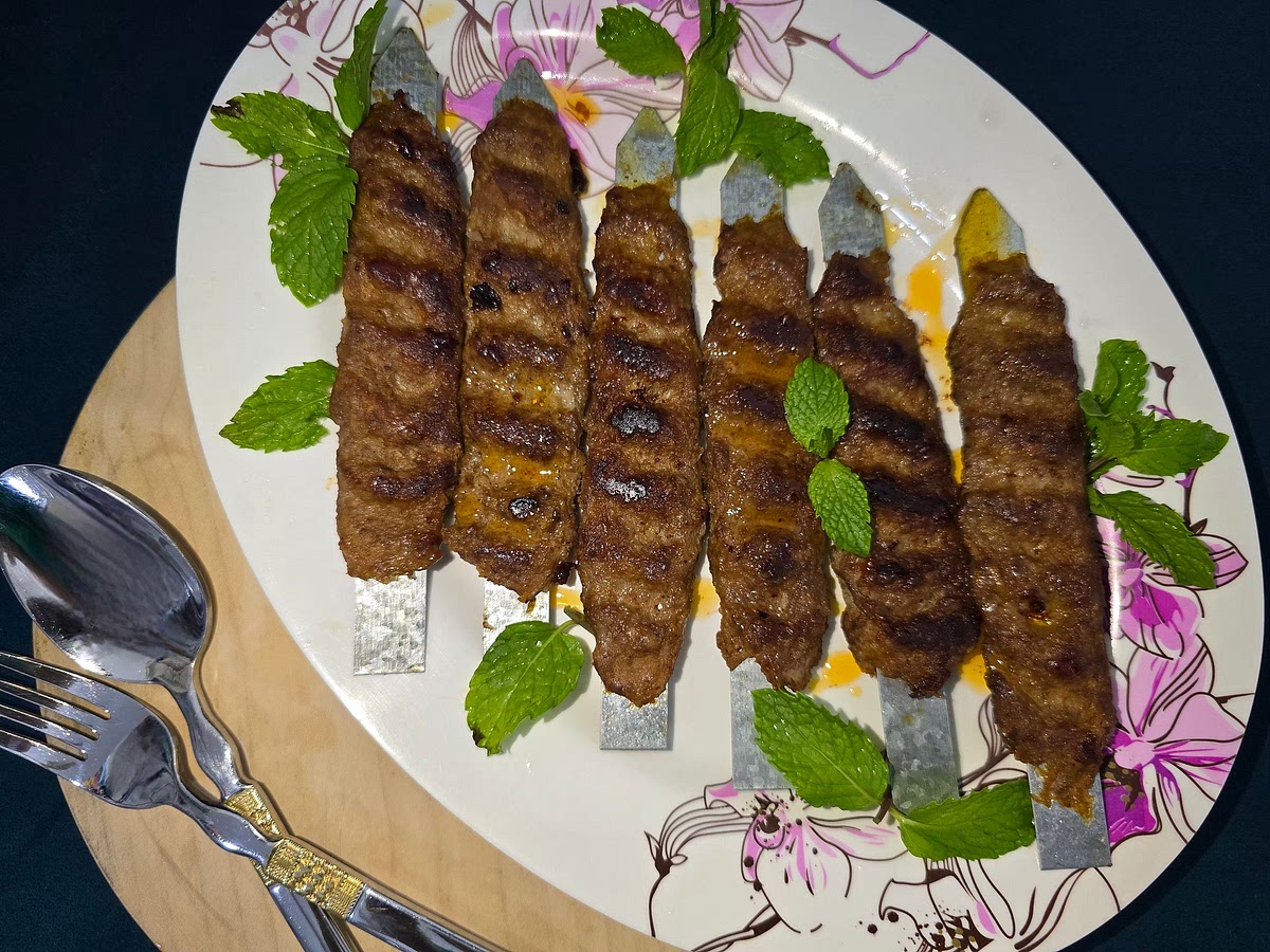Cook kababs until browned on all sides.