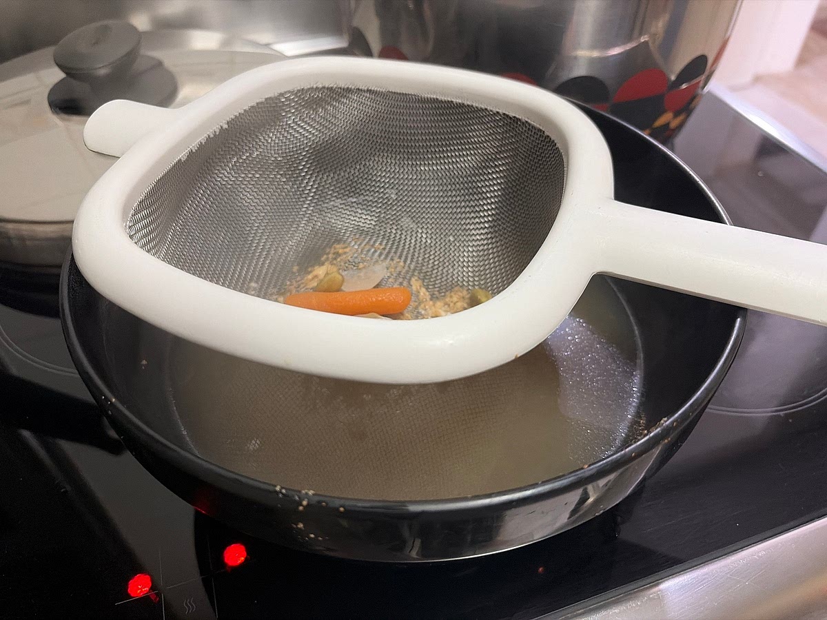 Strain out all the chicken water, do not throw