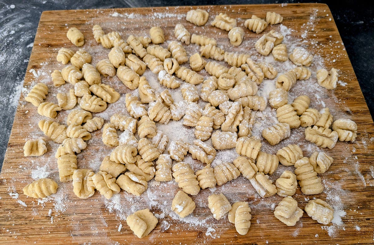 Ridge the gnocchi onto a large floured board or tray. You can skip this step if not ridging the gnocchi.