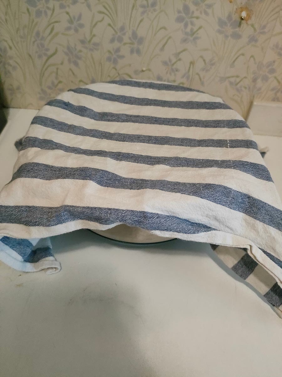 Cover with textile and wait between 2-3 hours. Dough should about double in size.