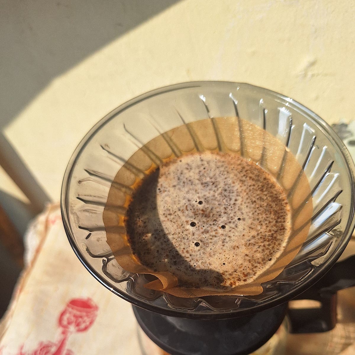 Pour in 150 grams of hot water and start a 5-minute timer.