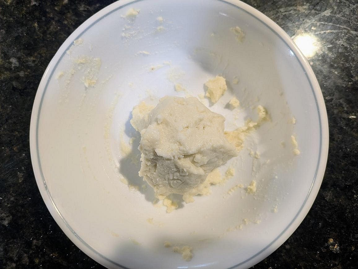 Mix in the protein powder, monk fruit, inulin, baking powder, salt, vanilla extract, and almond milk with a silicone spatula
