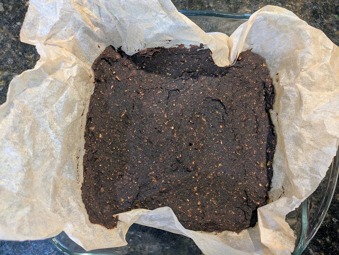 Bake at 350F for about 30 minutes. The top will be set and dark, the internal temperature should be about 205F, and a toothpick to the center will come out nearly clean