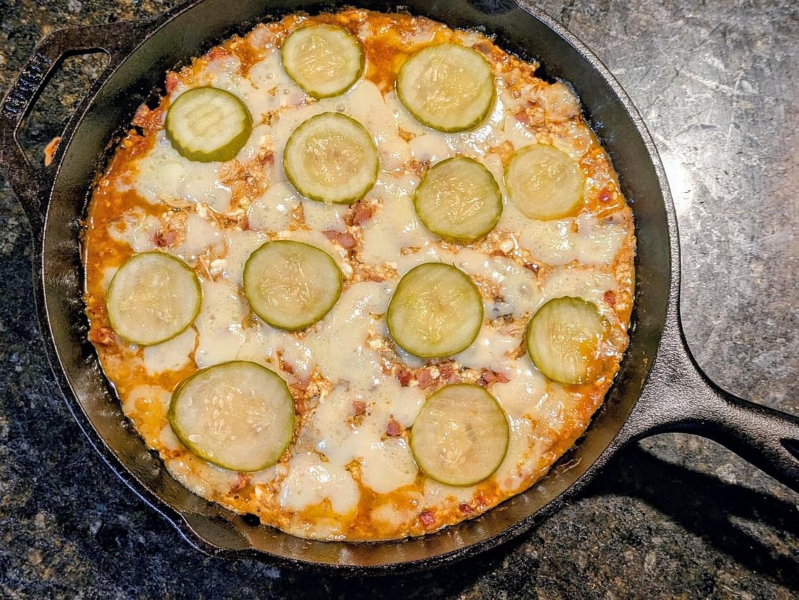Cover with foil and bake at 400F for about 20 minutes, or until steamy and bubbly. Optionally broil the top for 1-2 minutes to further brown the cheese
