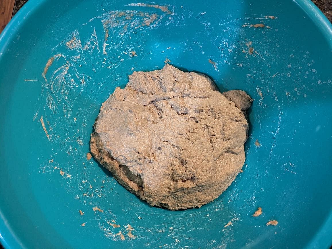 Cover with a plate or towel, and let rest in the microwave for 1 hour. It will have grown slightly, but not nearly doubled in size.