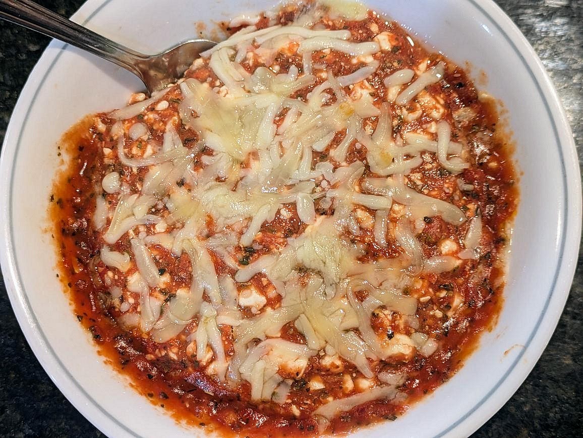 Cover with a plate and microwave for 1 minute. Let cool for 1 minute before eating.