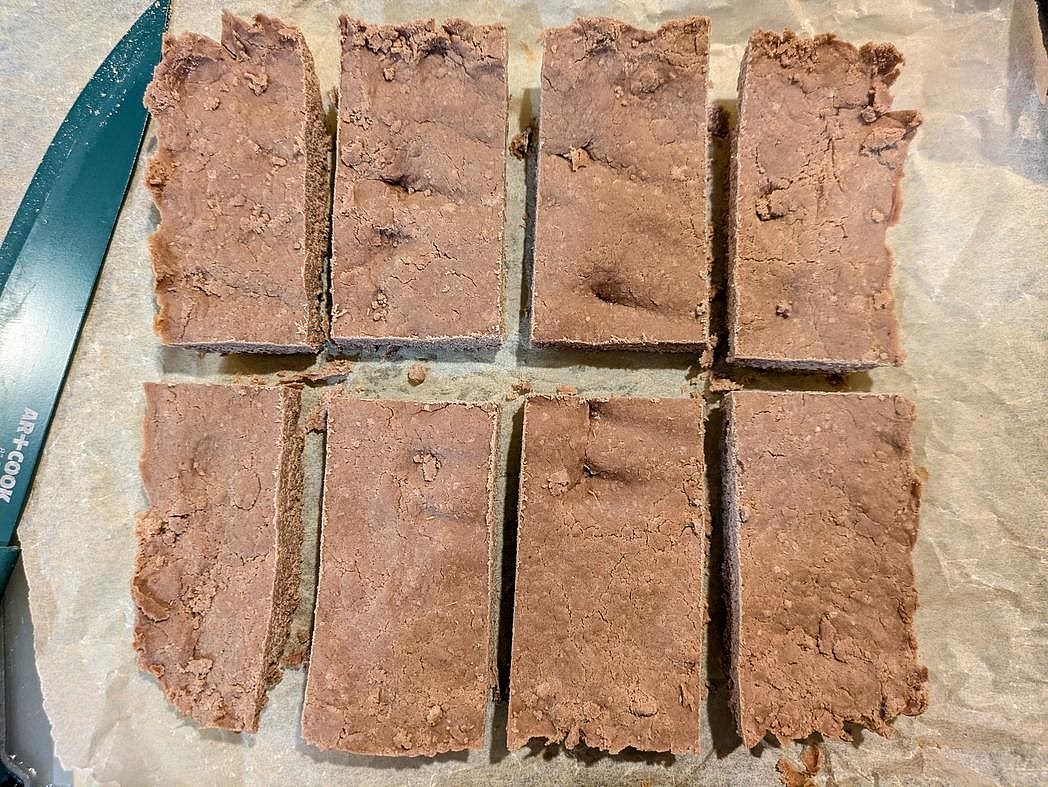 Refrigerate for at least 2 hours before slicing into 8 protein bars.