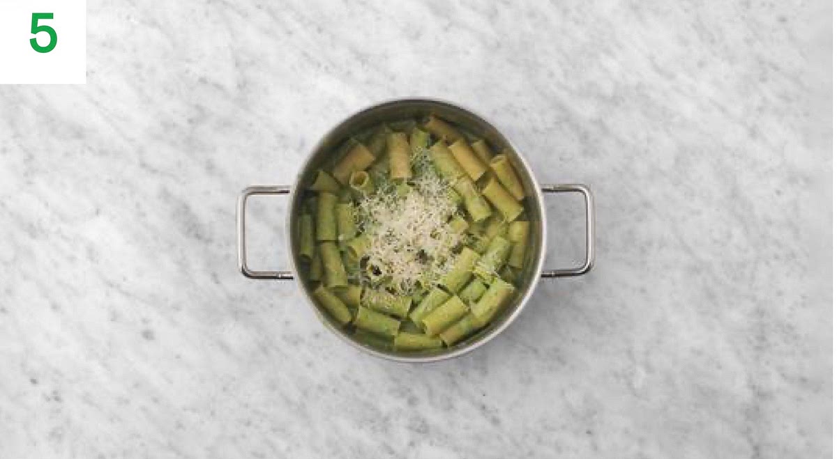 Once cooked, drain the rigatoni in a coleader and pop back in the saucepan. Stir in the creamy kale sauce.
Return the pan to the medium heat.
Stir in the water from the sauce and bring to a simmer. Stir until combined and the sauce has heated through, 1-2 mins.
Stir in the hard italian style cheese until melted, 1 min more. Remove from the heat and add a squeeze of lemon juice.
Taste and season with salt, pepper and more lemon juice if needed.