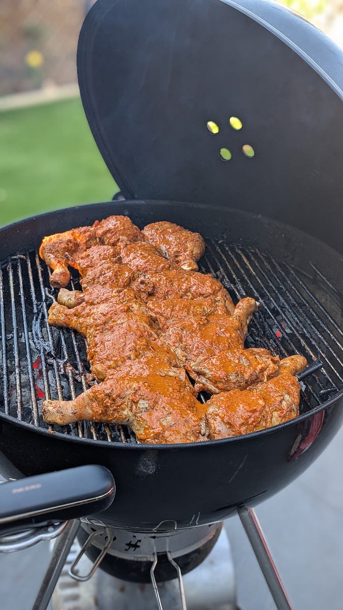 Preheat a grill for low indirect heat and add the marinade on top (from the raw chicken), smoke the chicken on low for atleast an hour. This step keeps the chicken moist while its being cooked.