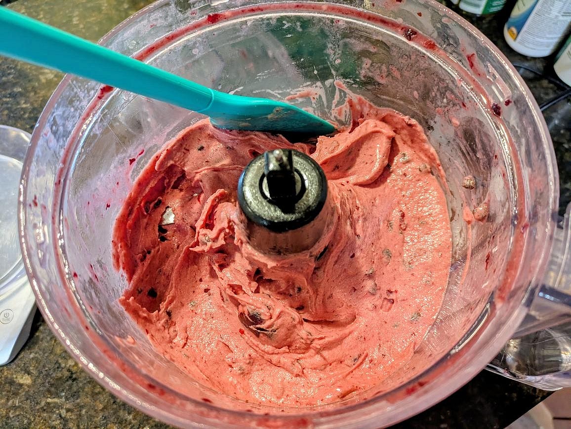 Add in the chocolate chips and your remaining cherries. Pulse to roughly chop the additional cherries.
