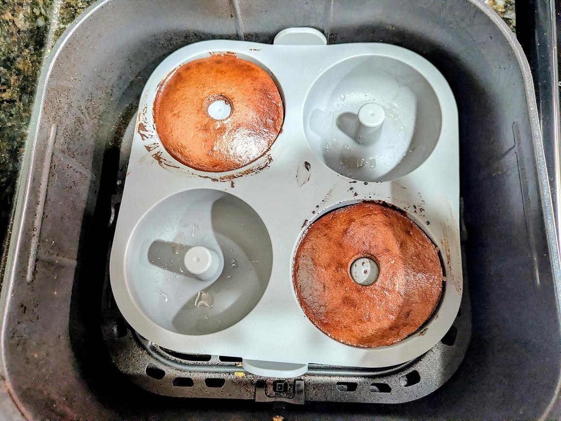 Air fry at 350F for about 10 minutes, or until they're lightly browned, solid, and a toothpick to the center comes out nearly clean. The internal temperature will be about 205F.