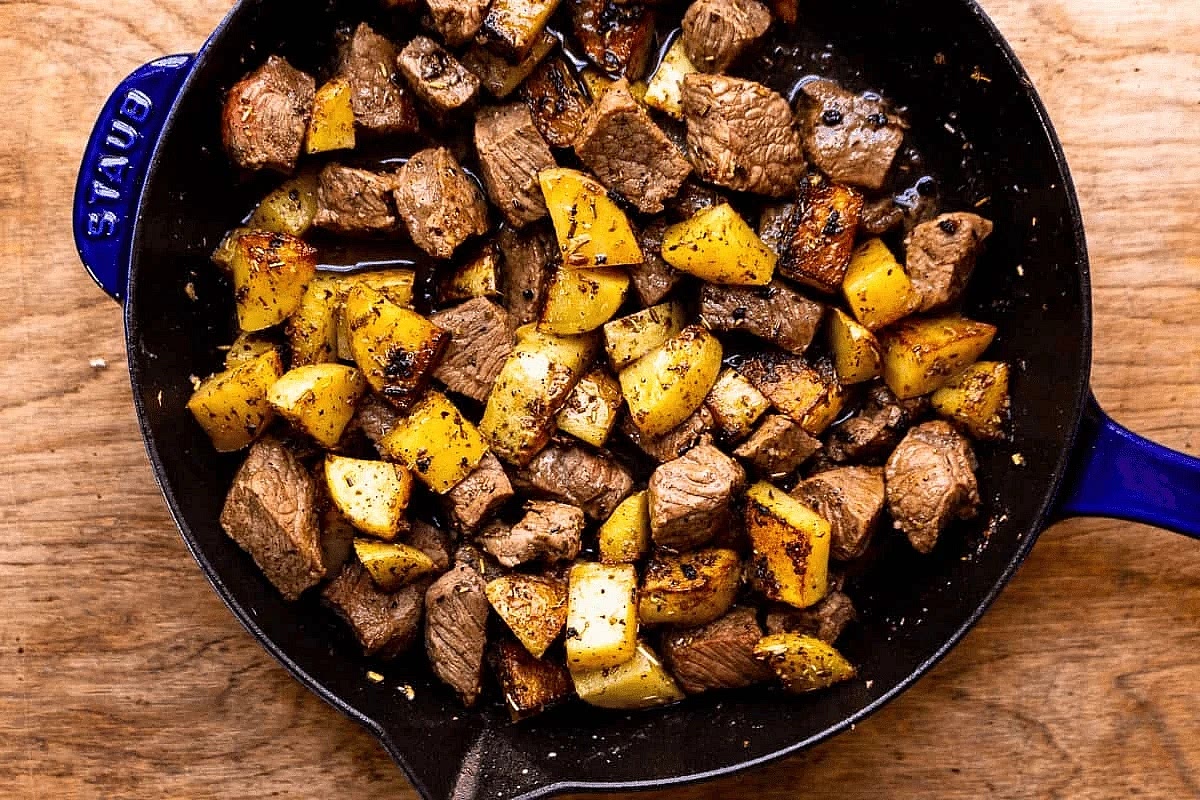 Add the cooked potatoes back to the skillet and toss together. Add additional salt and pepper if desired.
*Don’t crowd the pan; this will cause the potatoes and steak to cook unevenly or even steam rather than sear.*
