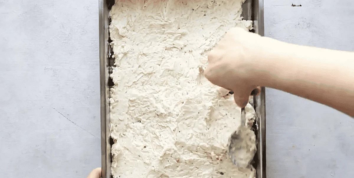 Spread the mixture evenly into the prepared 9×13-inch dish.
