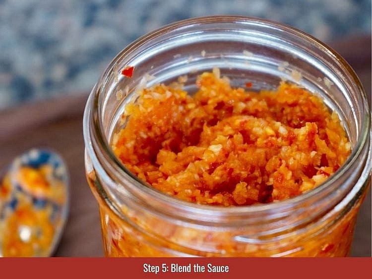 Combine the fermented habanero mash, roasted vegetable puree, and white distilled vinegar. Blend or stir until the sauce reaches an even, smooth consistency. Transfer the finished sauce to clean glass jars.