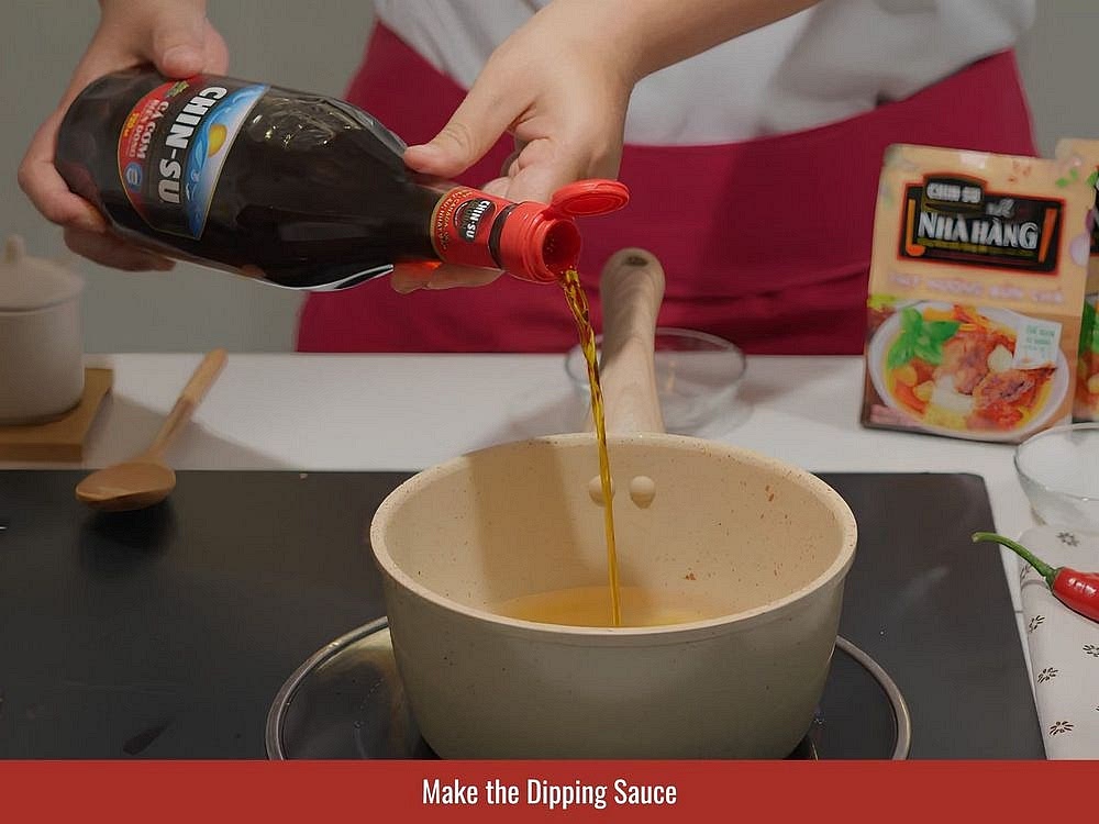 Make The Dipping Sauce
Combine water, sugar, minced garlic, vinegar, lime juice, and fish sauce in a saucepan. Use a starting ratio of 3 parts water to 1 part each fish sauce, sugar, and vinegar, then adjust the balance to taste. Bring the sauce briefly to a boil, then keep it warm until serving. Add sliced chili if desired.