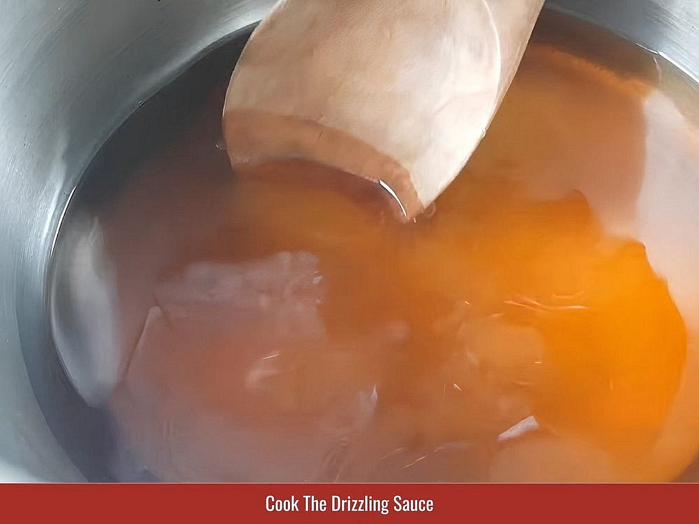 Cook The Drizzling Fish Sauce
Combine the fish sauce, sugar, and water in a saucepan. Heat until the sugar dissolves and the mixture reaches a boil. Add the pineapple and reduce the heat to low-medium. Simmer for 10 minutes until the sauce develops a light syrupy consistency. Remove the pineapple before serving and add minced chili if desired.