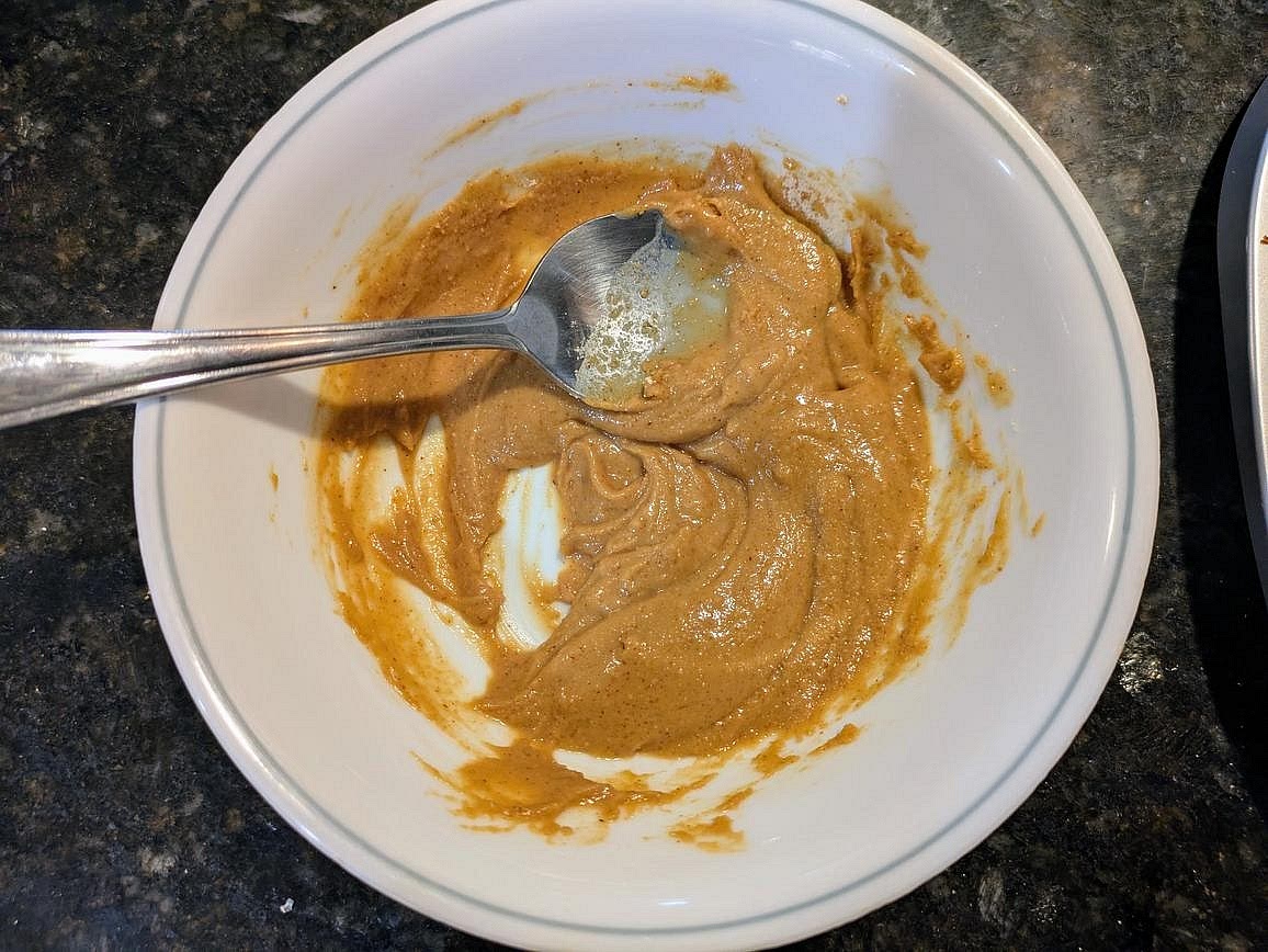 In a small bowl, mix together powdered peanut butter and sugar free syrup with a silicone spatula, and set aside.