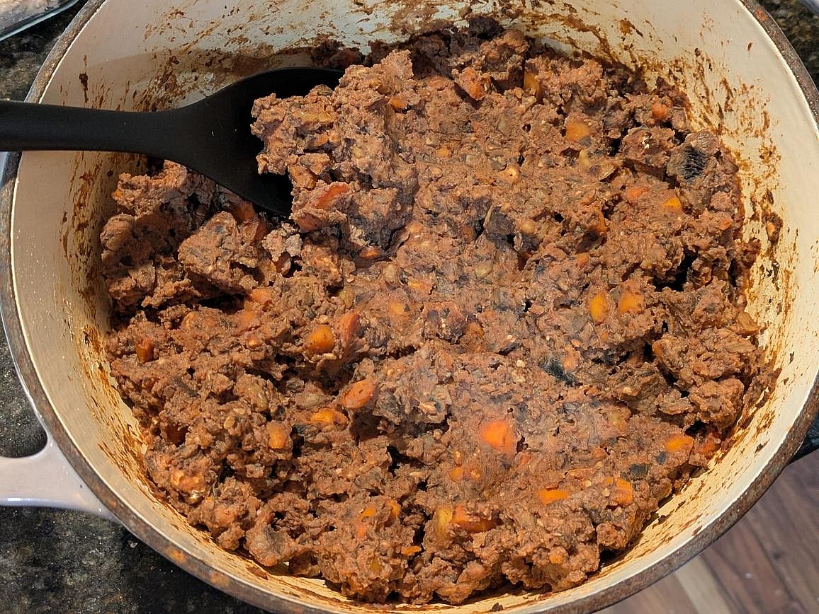 Turn off heat and add walnut and tomato paste mixture. Mix thoroughly to combine. Mix in your protein powder, add in just enough water if necessary to get all the protein powder mixed in, and season with salt to taste.