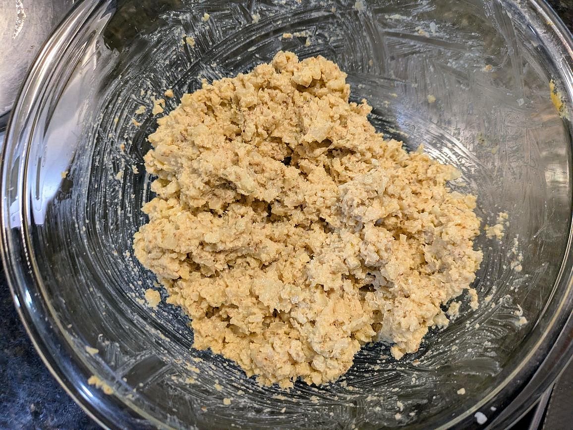 Add the flax egg to the bowl, and mix with a silicone spatula to form a dough.