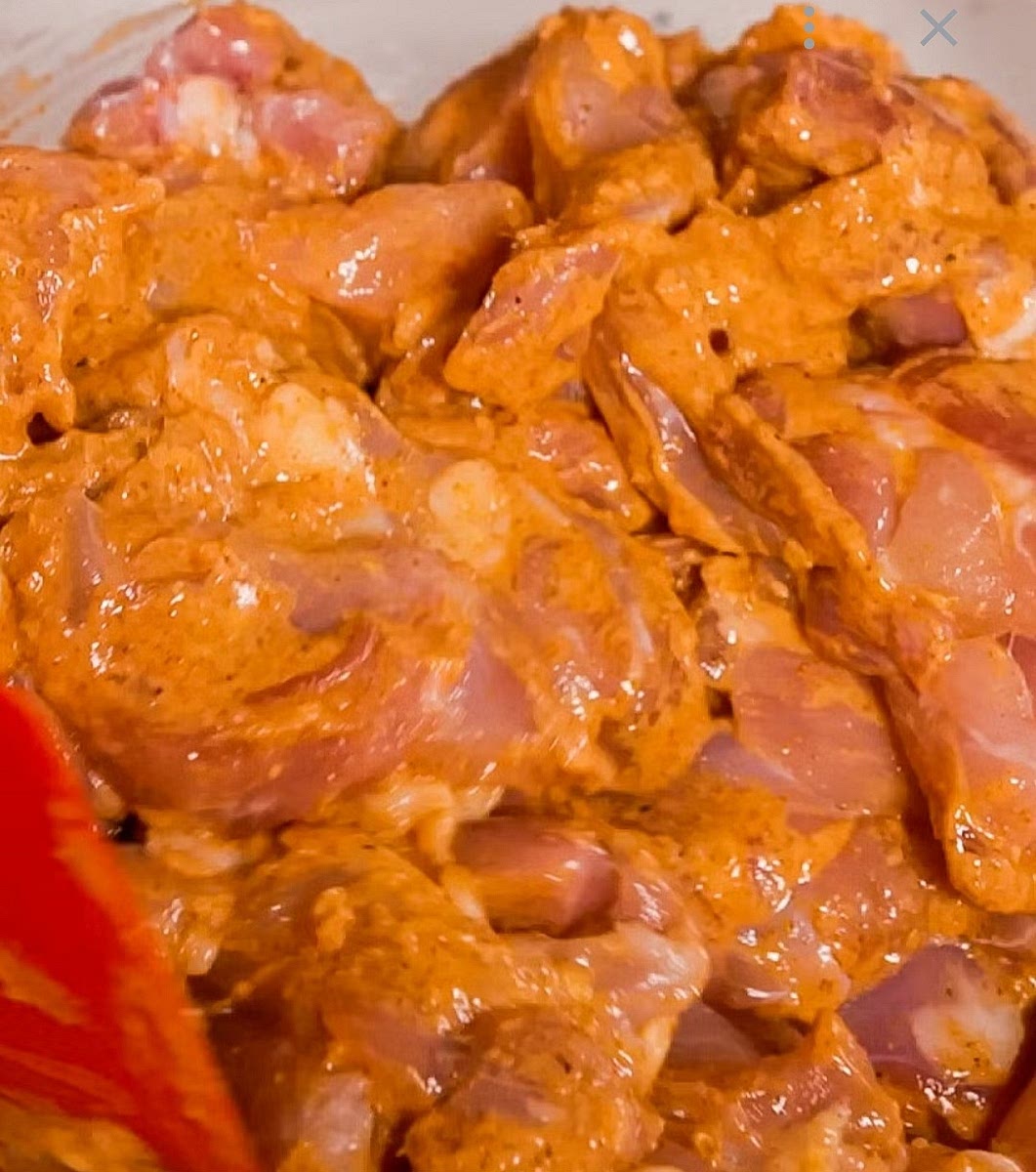 Mix the yogurt, lemon juice, and spices in a bowl. Add the chicken pieces and let them sit for 30 minutes.