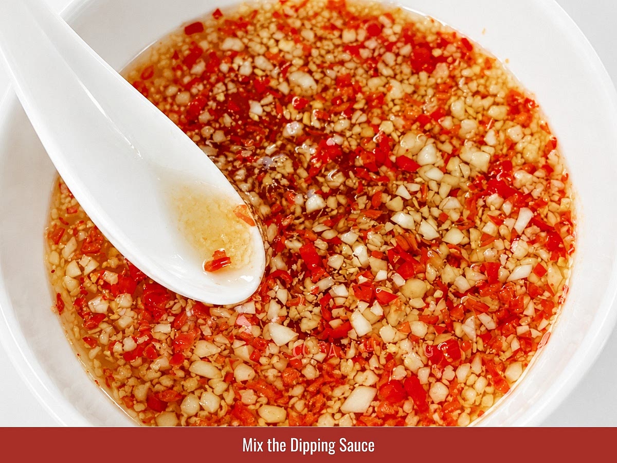 Mix lime juice, sugar, water, and fish sauce until balanced. Add garlic, chili, rice vinegar, and carrot if desired.