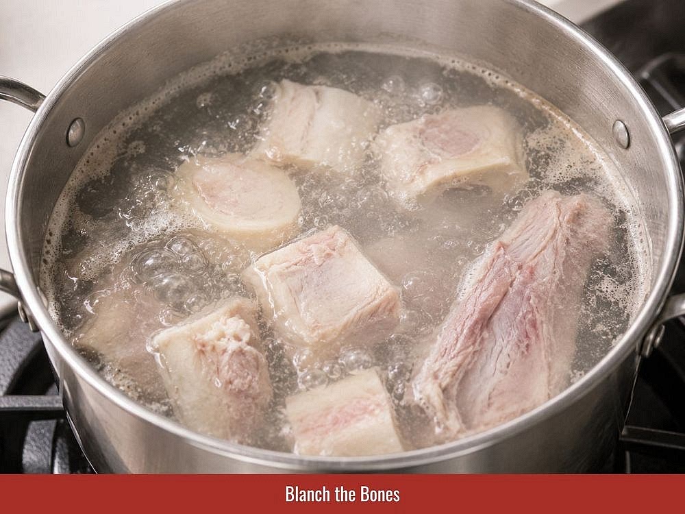 Simmer beef bones with water over low heat while regularly skimming foam from the surface. Slow cooking extracts collagen, sweetness, and rich beef flavor.