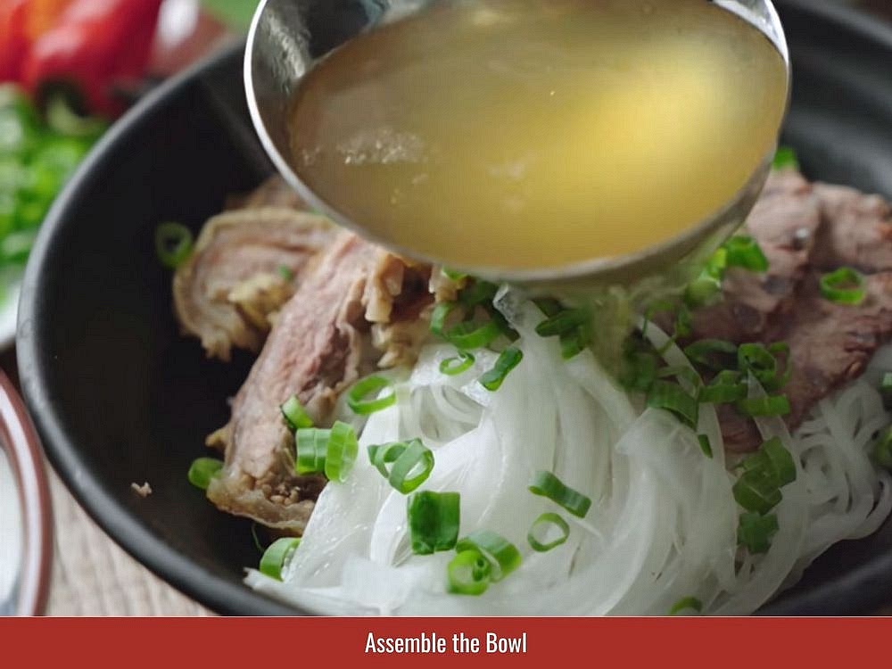 Place noodles in bowls, add sliced beef, and pour hot broth over the top. Finish with herbs, bean sprouts, lime, chili, and sauces.