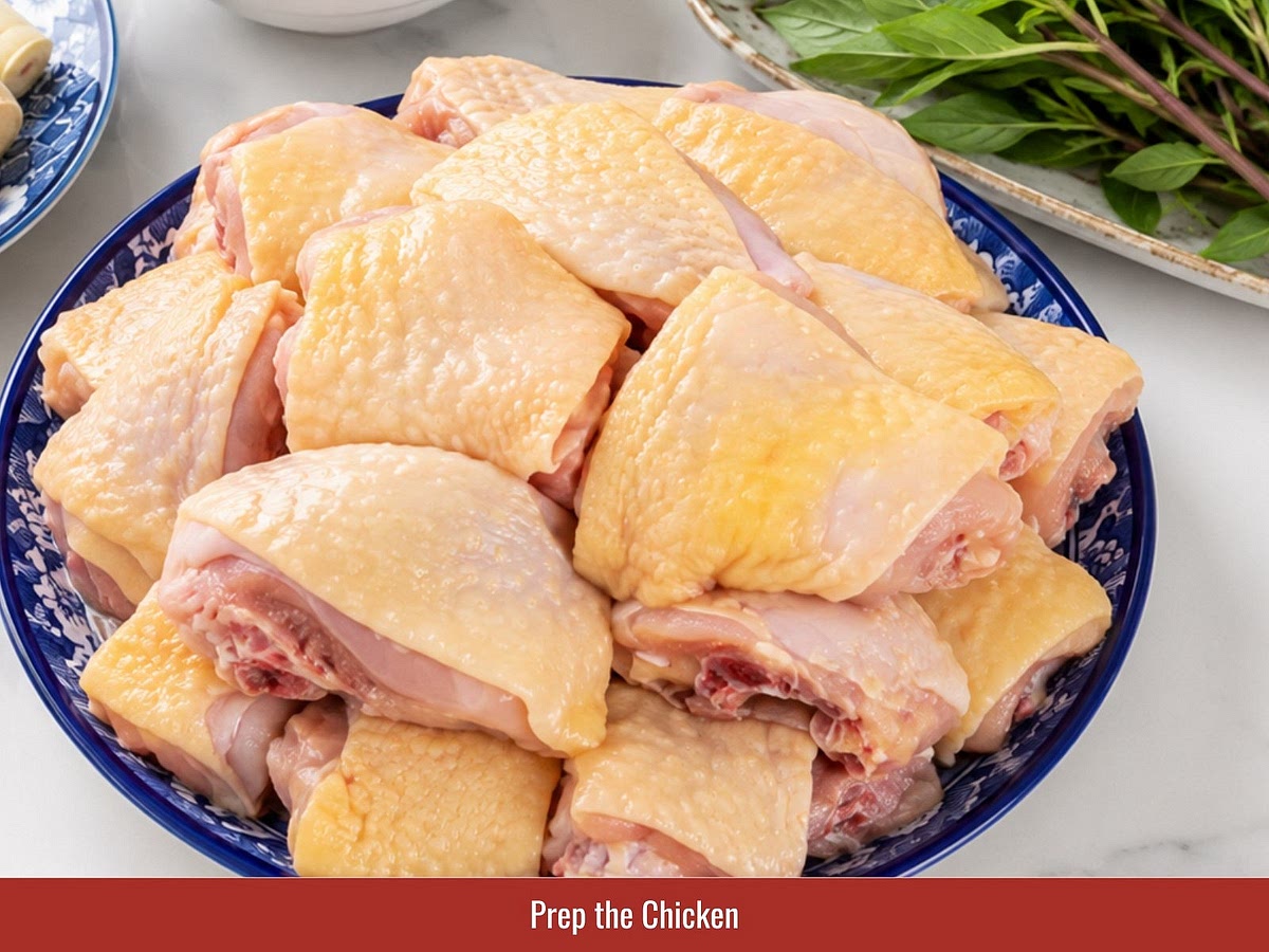 Pat the chicken pieces dry and cut them into even bite-sized pieces. Drying the chicken helps the marinade coat better and improves browning during cooking.
