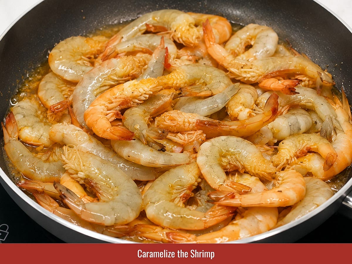 Add shrimp to the sauce and stir until evenly coated. Cook over medium heat until shrimp turns opaque and red-orange while the glaze reduces and clings to the shells.