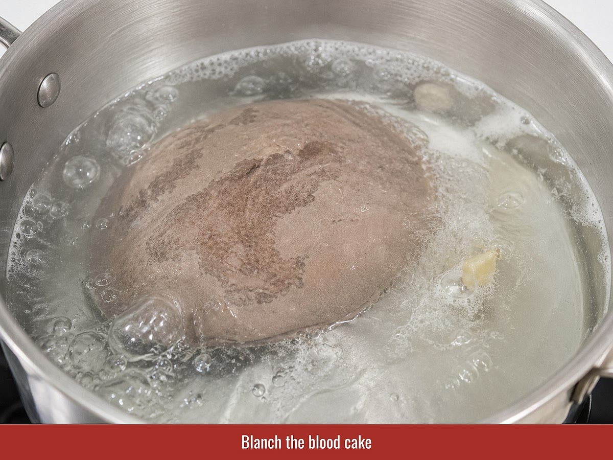 Blanch pork blood cake, shrimp, and prepare quail eggs. Slice pork skin and reserve all toppings for final assembly.