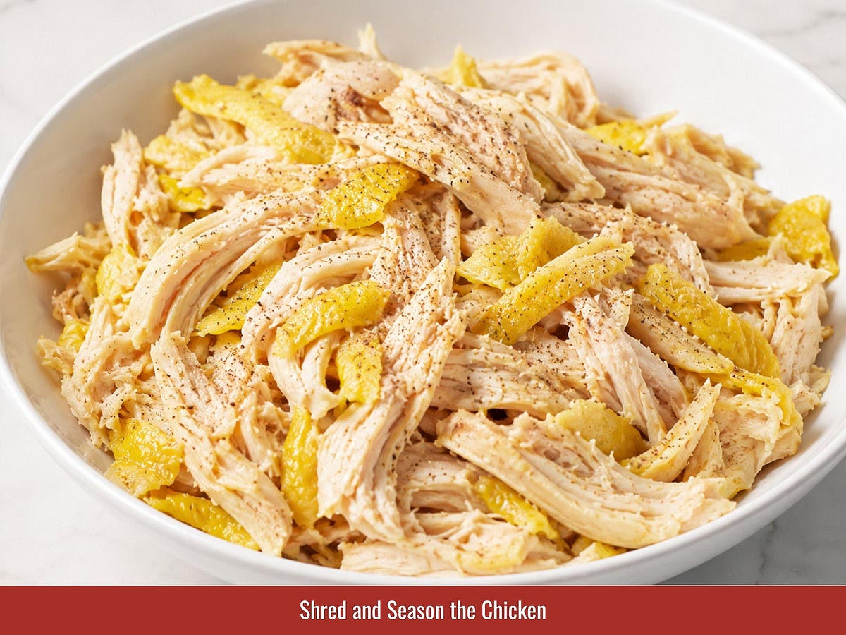 Remove chicken from the broth after resting. Shred the meat into bite-sized pieces and season with salt, sugar, pepper, and lime juice.