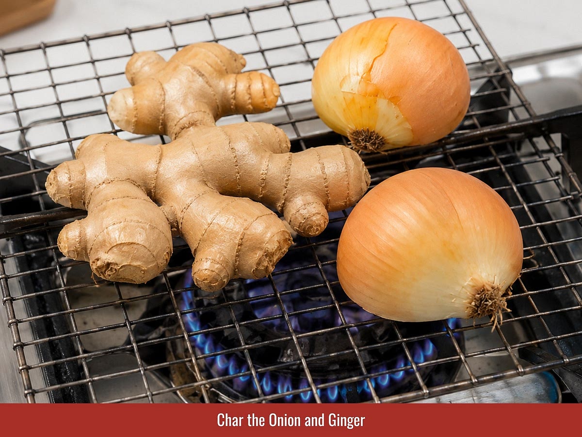 Char the onion and ginger over an open flame or dry skillet until lightly blackened and fragrant. This develops sweetness and adds the classic pho aroma.