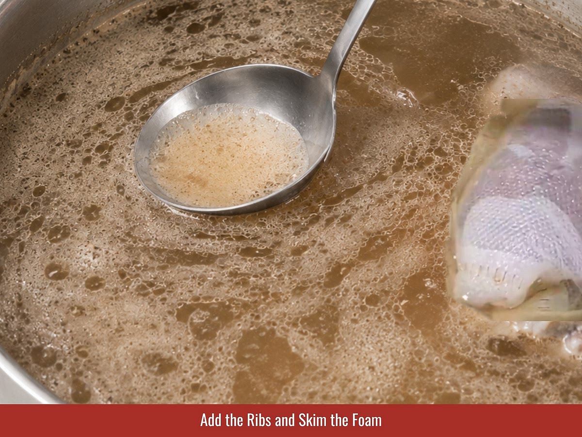 Add parboiled ribs into the broth and skim foam from the surface as it appears. Keep the broth clear by avoiding vigorous boiling.