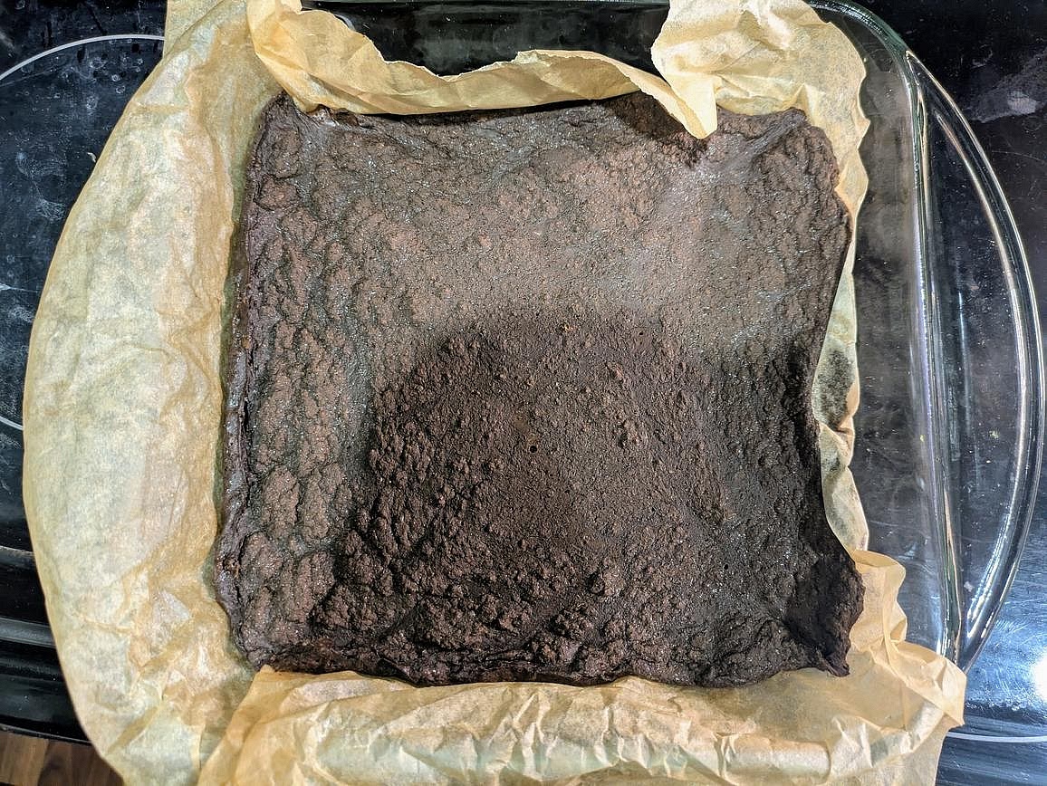 Bake uncovered at 350F for 30 minutes. After 30 minutes, tent the pan with foil, and bake for an additional 30 minutes. The top will be browned and set, and the center should jiggle slightly when you tap the side of the pan. A toothpick to the center will not come out clean.