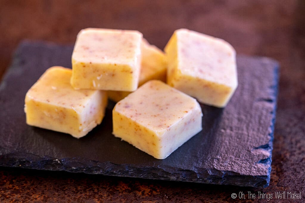 Add the whipped brown butter to candy molds and freeze or refrigerate until solid.
- Unmold the solid bites from the molds.