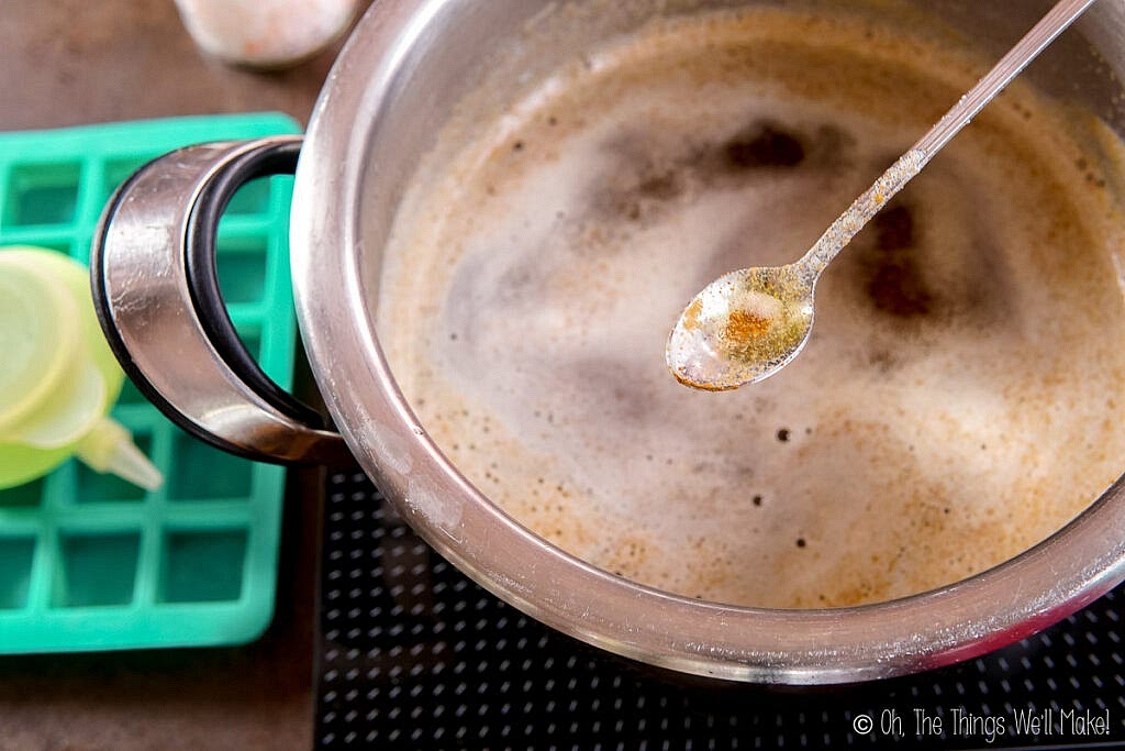 Once the milk solids have browned, remove the butter from the heat source. The residual heat in the pan will continue to cook the butter, so it's important to remove it from the heat as soon as it's done.