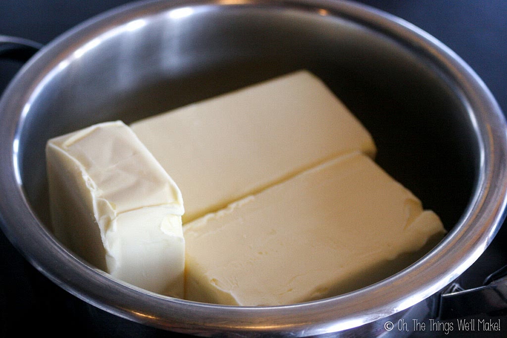 Place the butter in the pan and melt it over medium-high heat. Stir the butter occasionally as it melts.