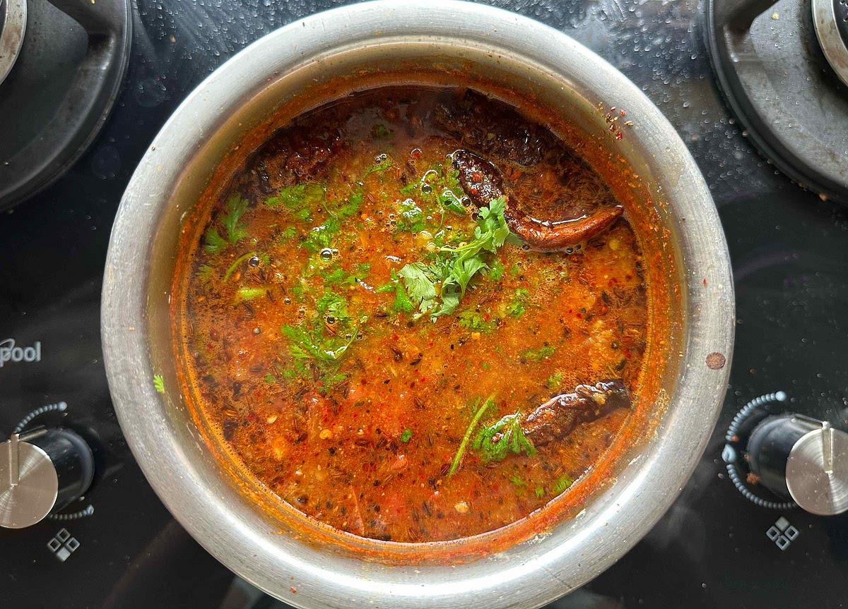 Garnish with coriander and serve hot.