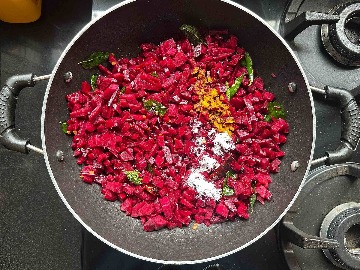 Add chopped beetroot, salt, and haldi, and stir well.
Optional: add 1/4th spoon of sugar if needed