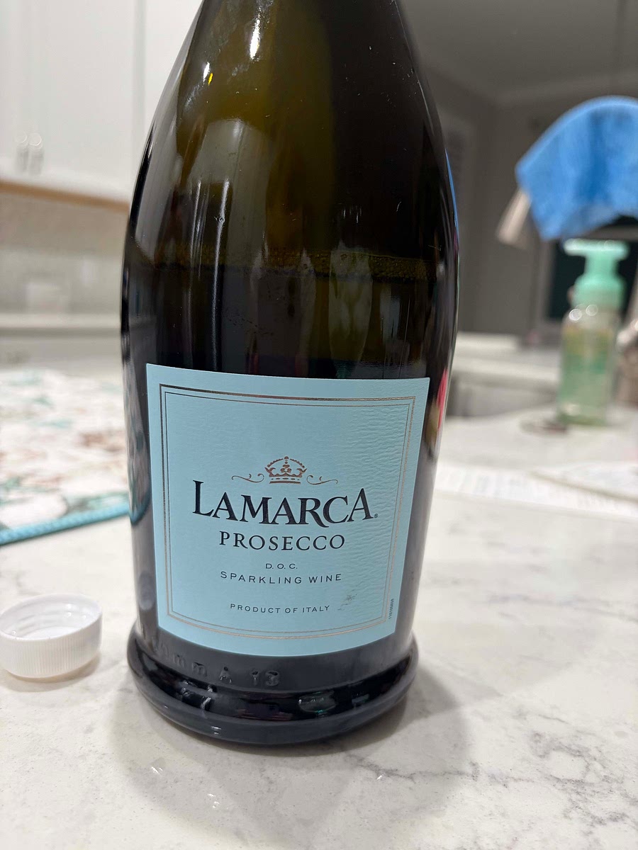 Add scant 1/2 cup prosecco. Add the full 1/2 cup if you like.