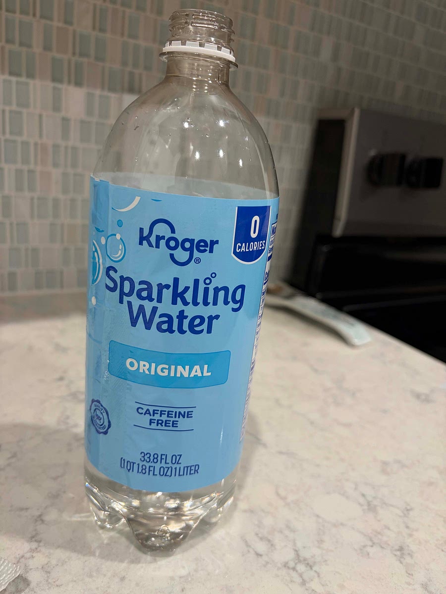 Add 1/8 cup sparkling water. Stir with butter knife.