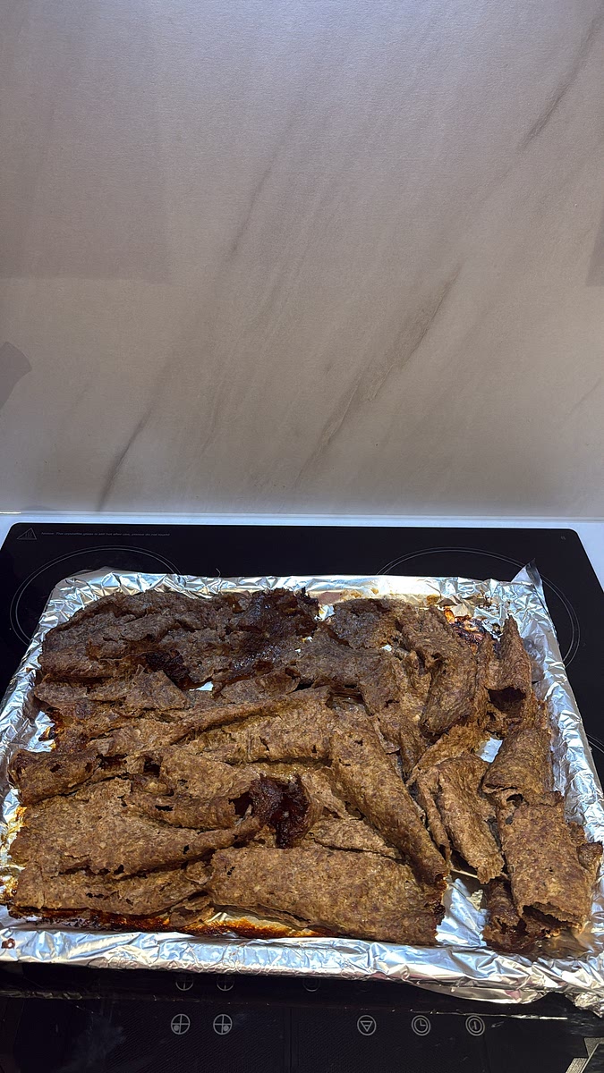 If you want those darker, slightly crispy kebab-shop edges, put the meat back into the oven for a little longer until nicely browned.