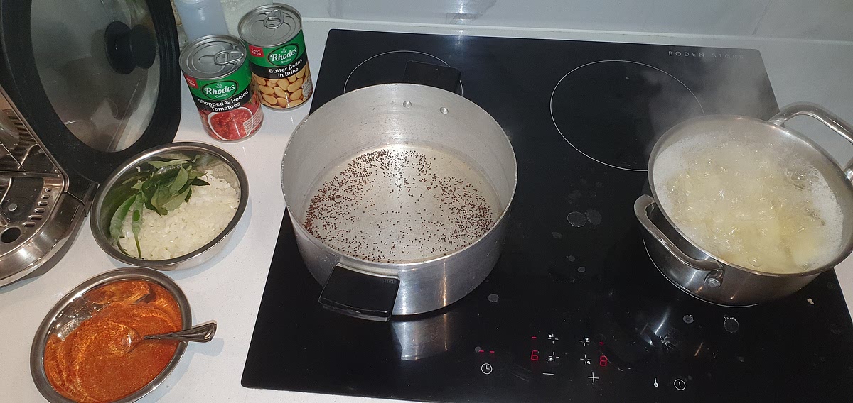 Add the mustard seeds to a large pot with the oil, then turn the heat up to medium.