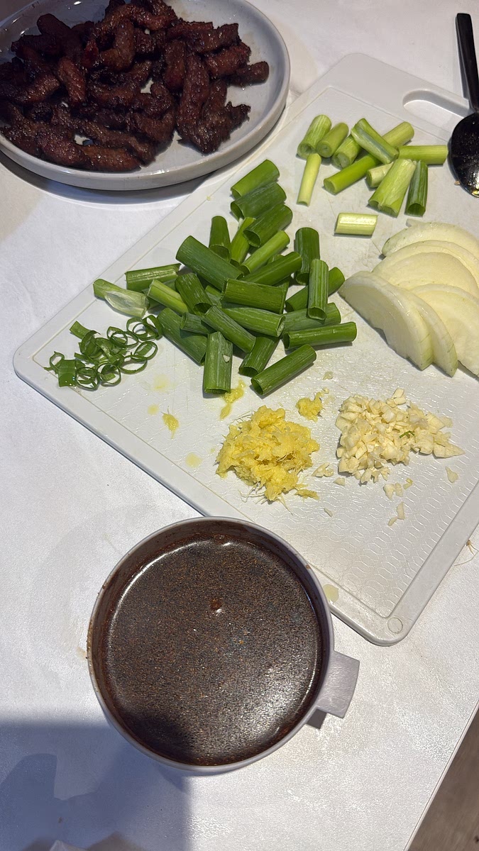 In a small bowl or jug, combine the water, light soy sauce, dark soy sauce, oyster sauce, brown sugar, MSG, white pepper and Chinese five spice. Mix until the sugar begins to dissolve and set aside.