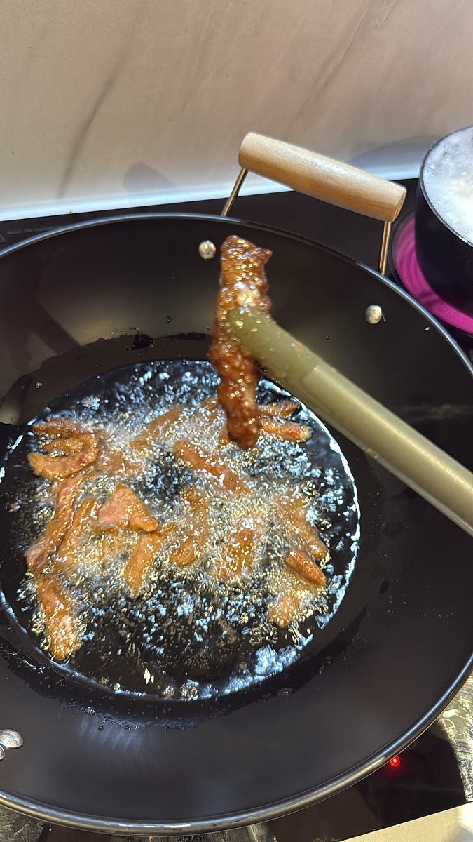 Once hot, fry the beef in batches rather than adding everything at once. Because the strips are thin, they won’t take long.