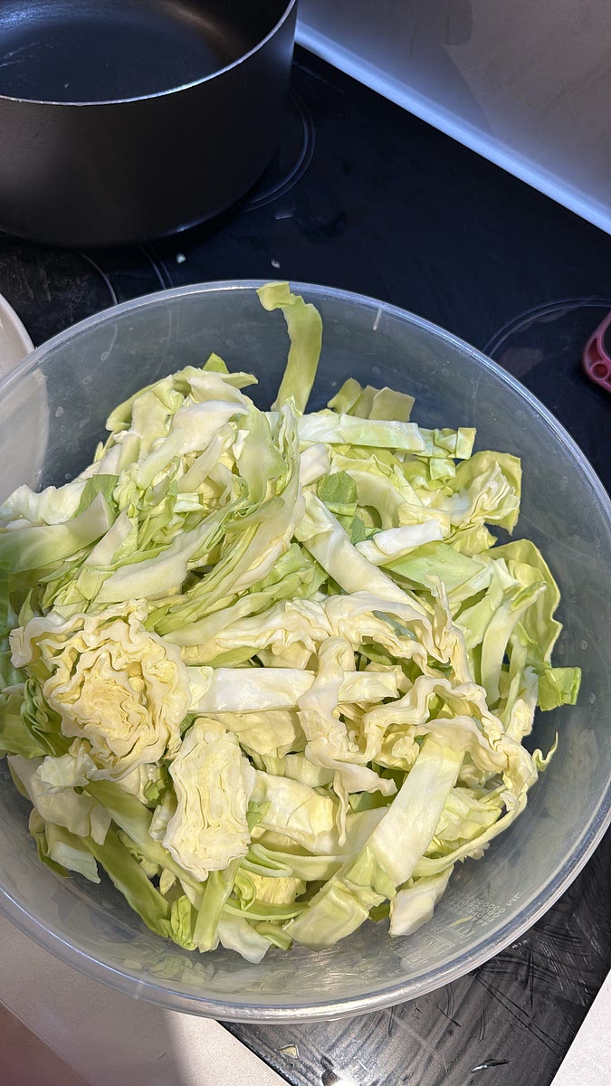 Wash and roughly chop the cabbage into medium-sized pieces.