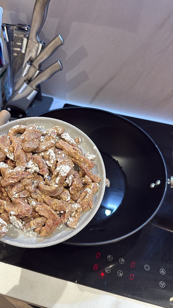 Heat a generous layer of oil in a wok or frying pan over medium-high/high heat.