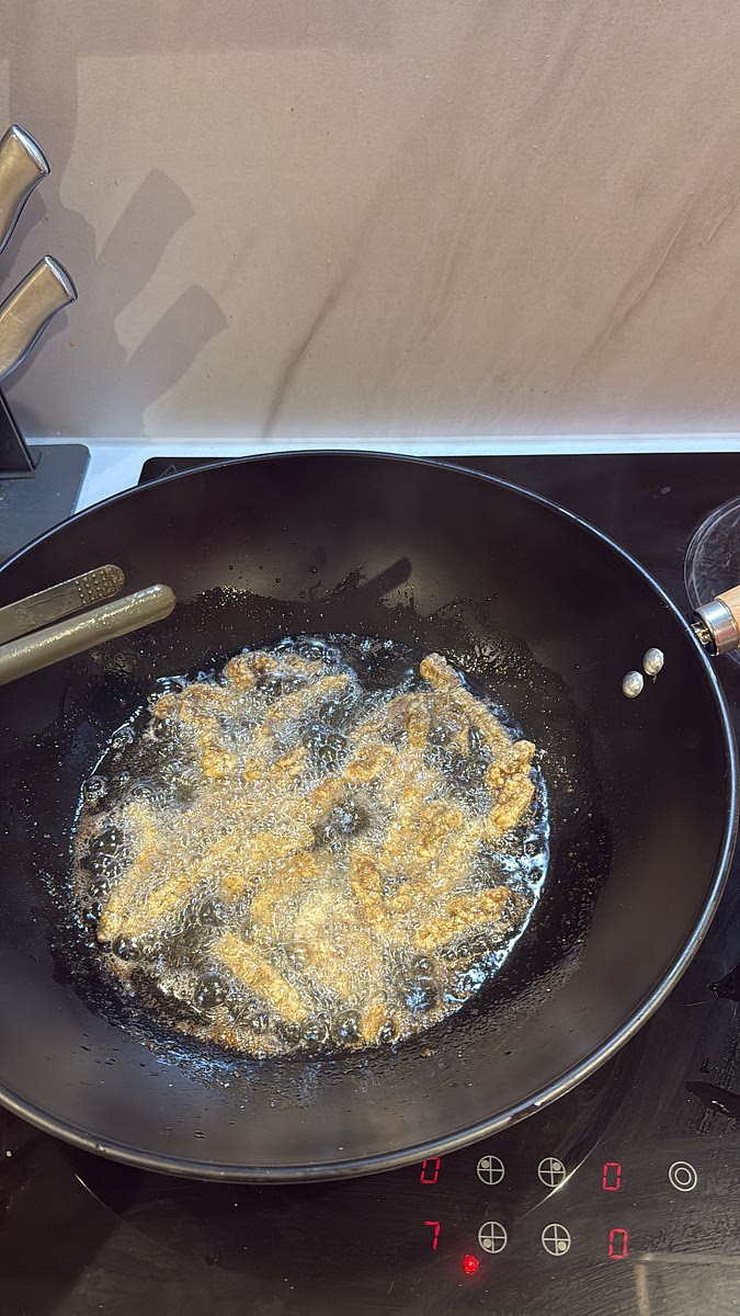 Fry the beef in batches so you don’t overcrowd the pan. Cook for around 3–4 minutes until deep golden and crispy.